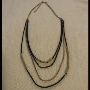 Multi-layered gold/black necklace